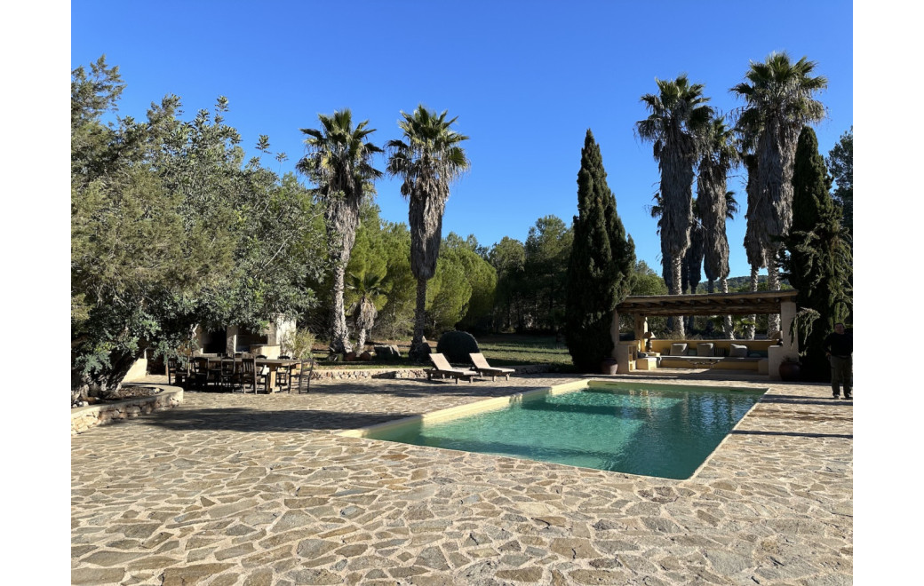 Traditional Ibizan finca with stone walls and patina